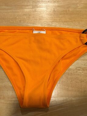 NWT Roxy women’s orange bikini bottoms size M